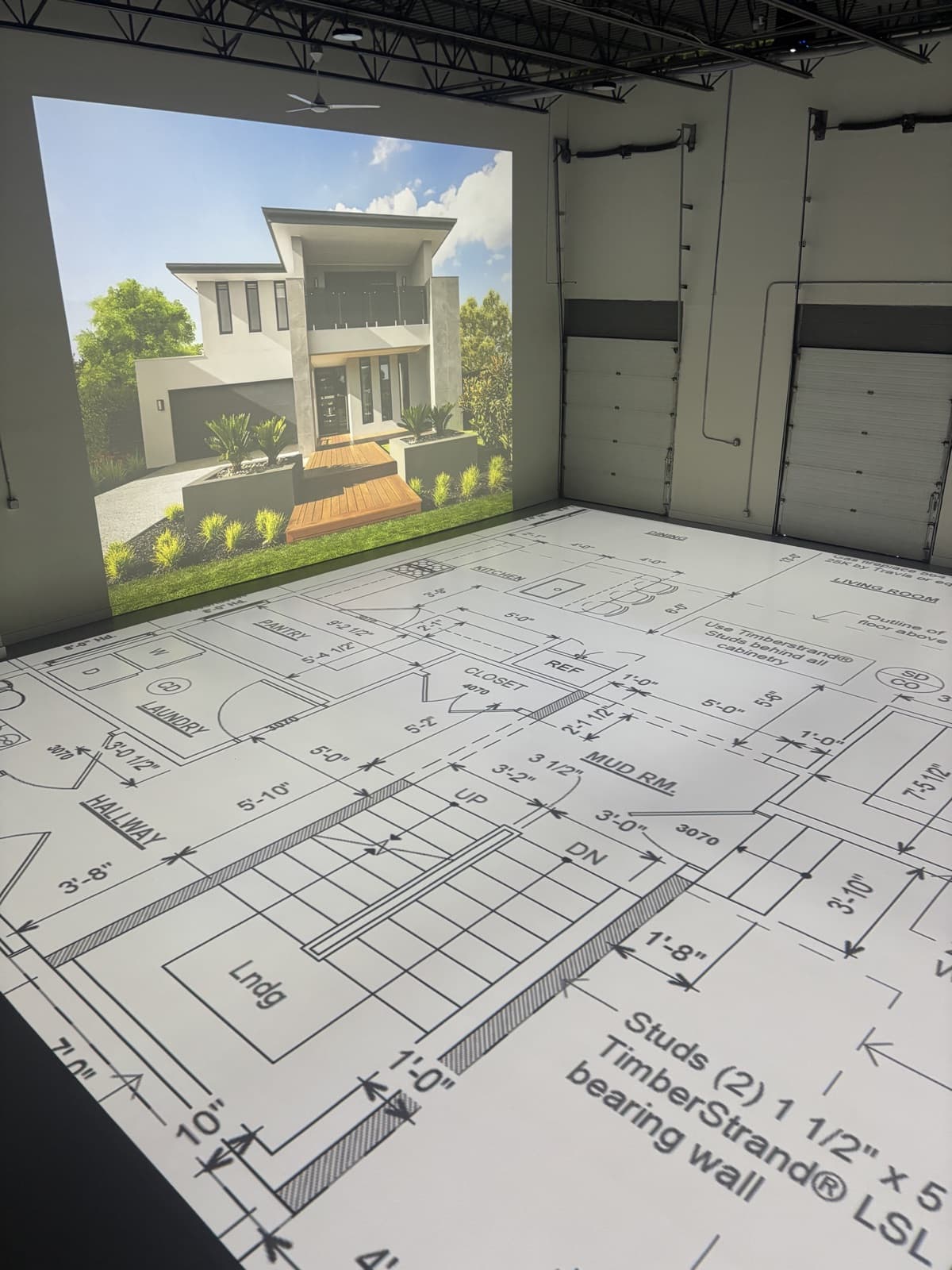 Guests exploring a WalkThru full-scale projection